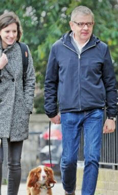 Isla Atkinson father Rowan Atkinson with his girlfriend Louise.